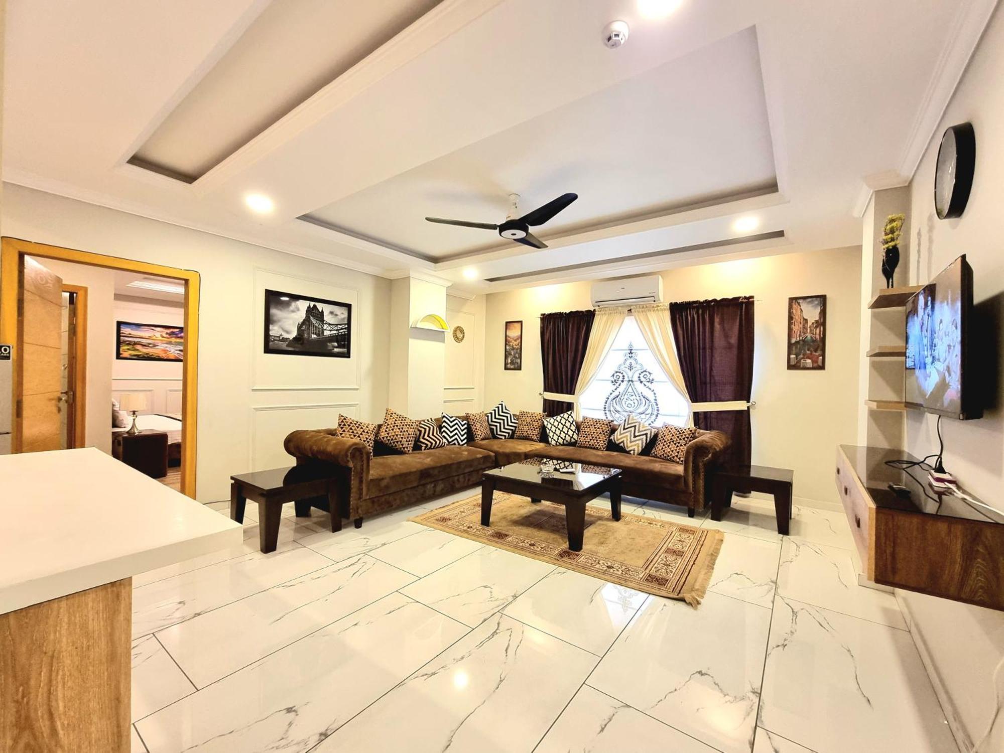 The Millenial Apartments & Suites Bahria Town Rawalpindi Oda fotoğraf