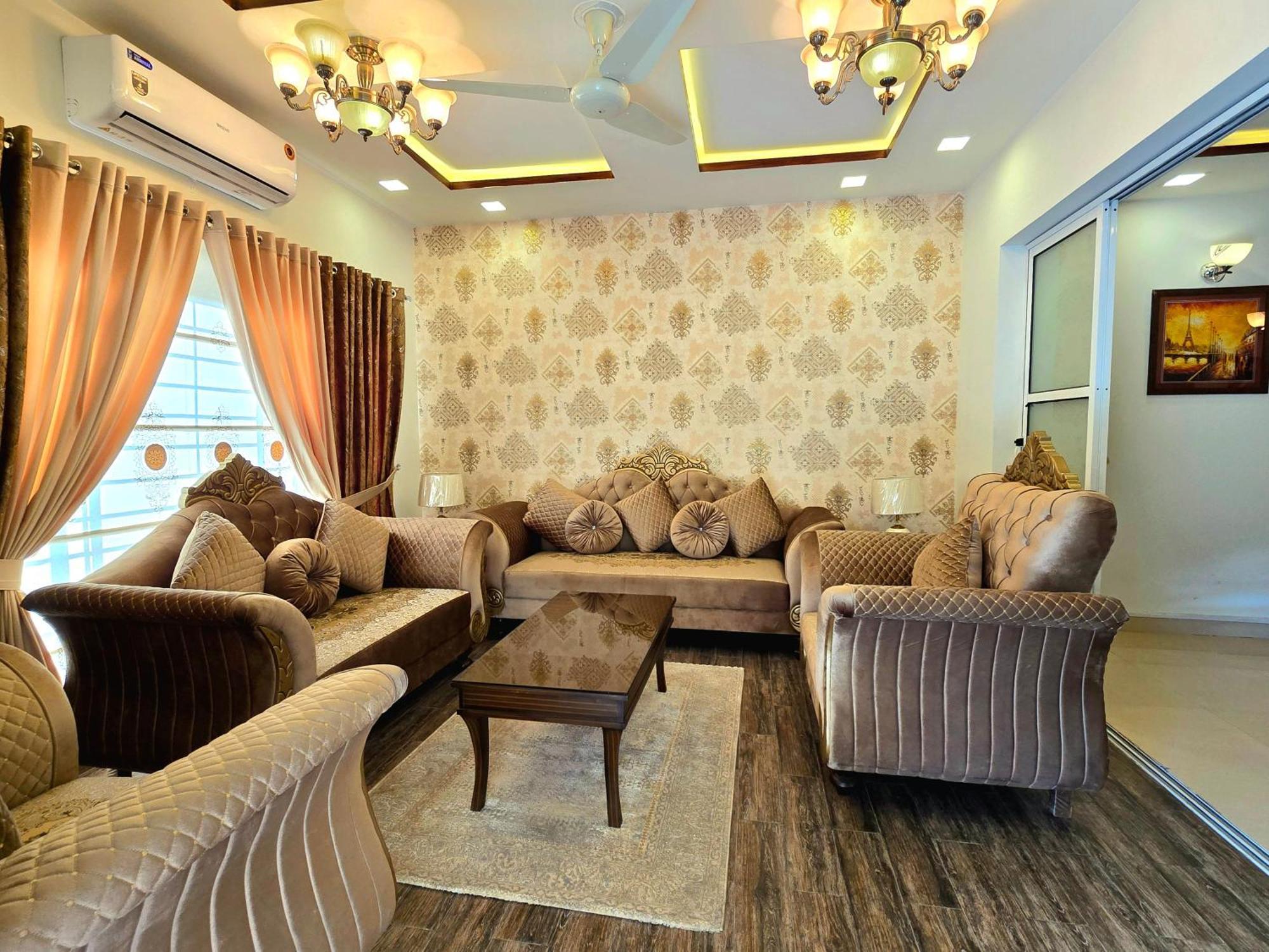 The Millenial Apartments & Suites Bahria Town Rawalpindi Oda fotoğraf